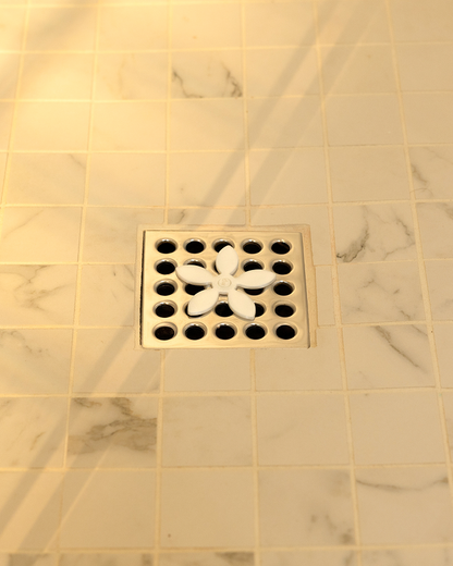 DrainWig hair catcher installed in shower drain