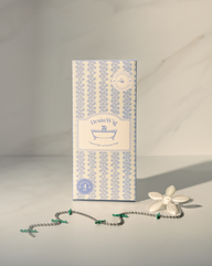 white-daisy|DrainWig hair catcher daisy displayed on counter